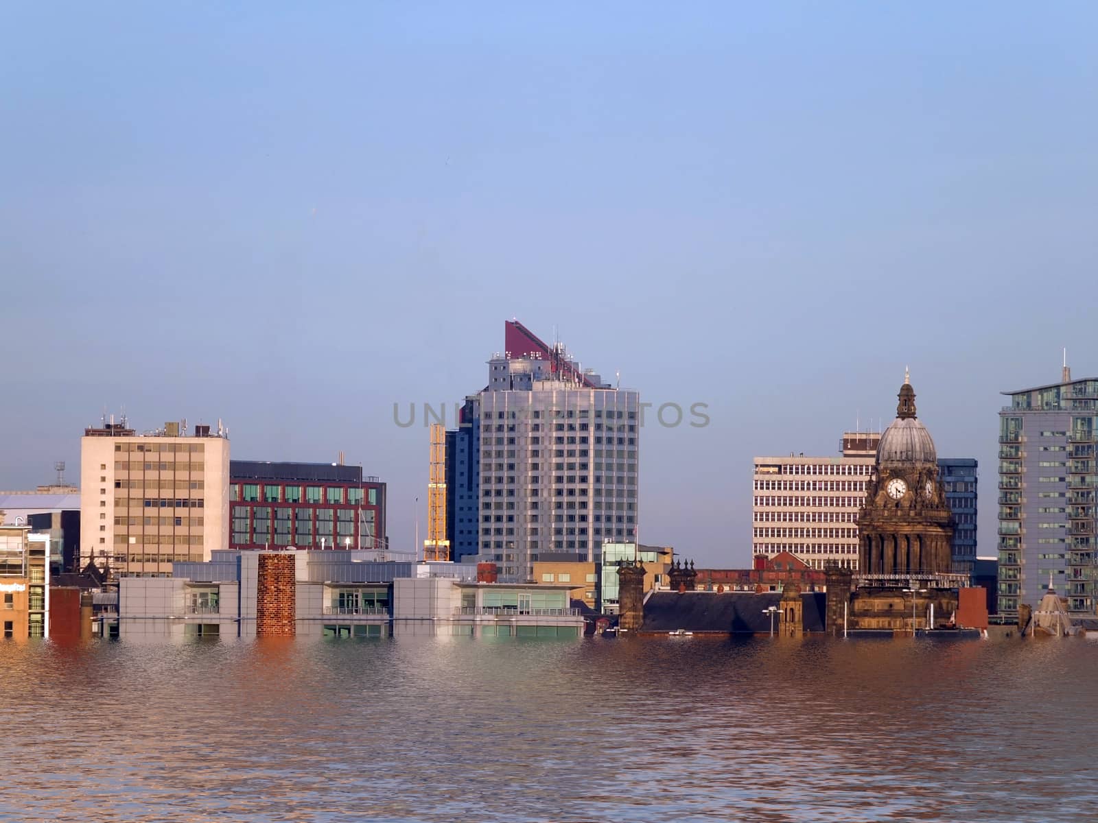 A conceptual cityscape view of leeds showing the buildings and city hall after flooding due to global warming