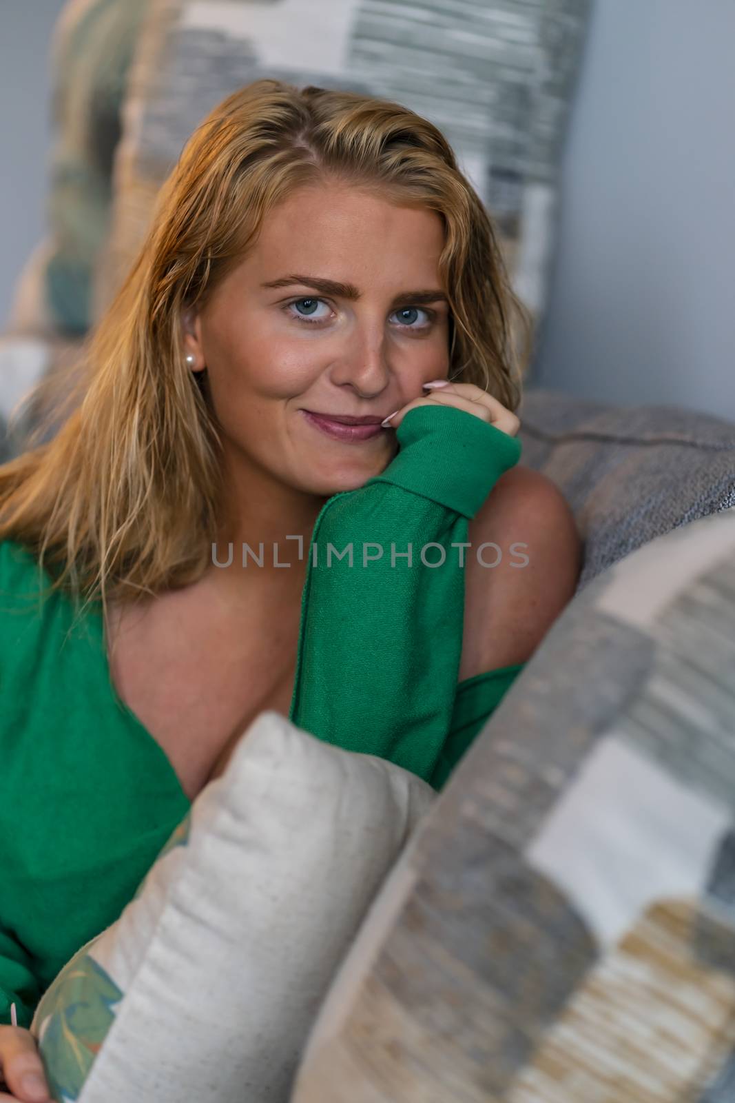 A gorgeous blonde model enjoys a day at home before work