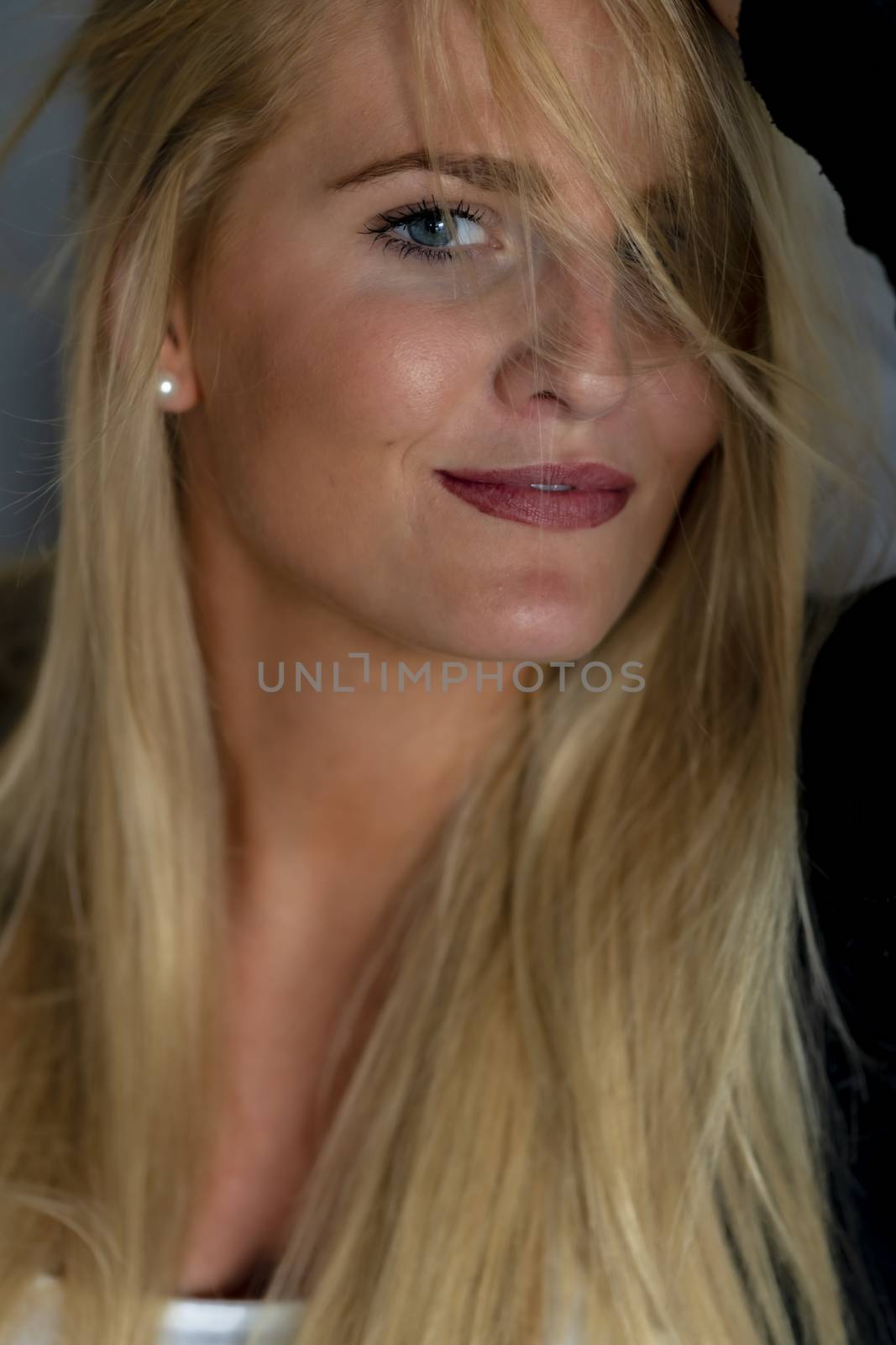 A gorgeous blonde model enjoys a day at home before work