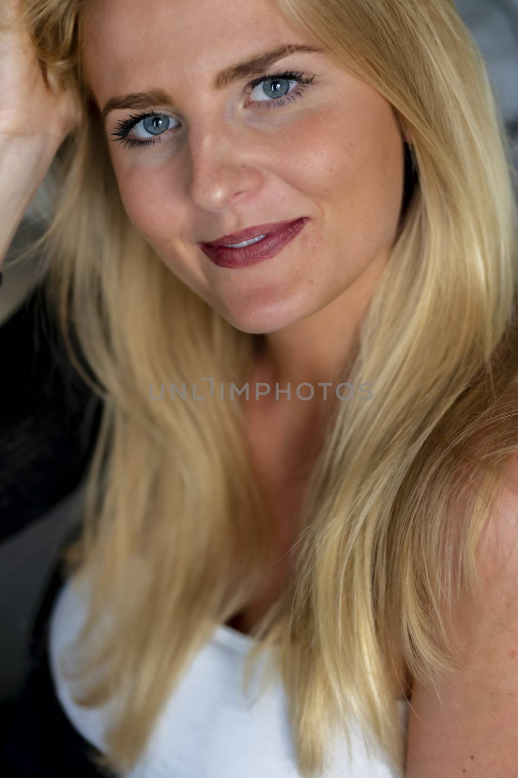 A gorgeous blonde model enjoys a day at home before work