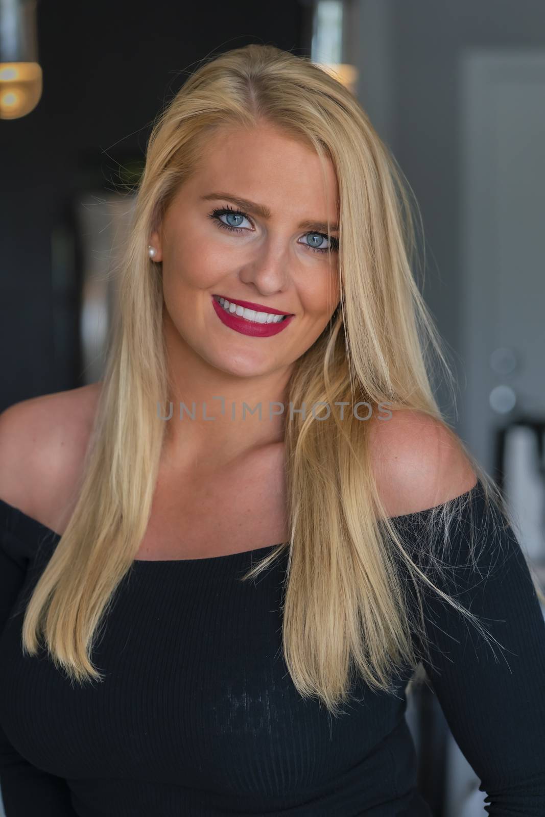 A gorgeous blonde model enjoys a day at home before work