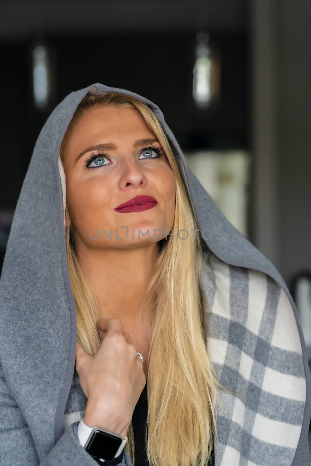 A gorgeous blonde model enjoys a day at home before work