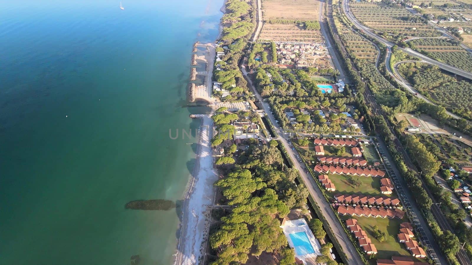 Amazing aerial view of Tuscany coastline in summer season, Italy.