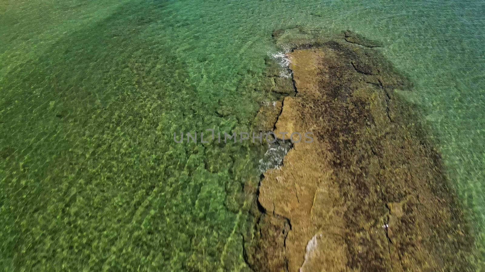 Ancient road in the ocean, old roman ruin. Aerial viewpoint