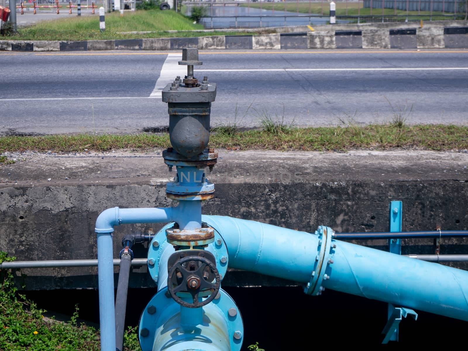 Control knobs for big water blue pipes by shutterbird