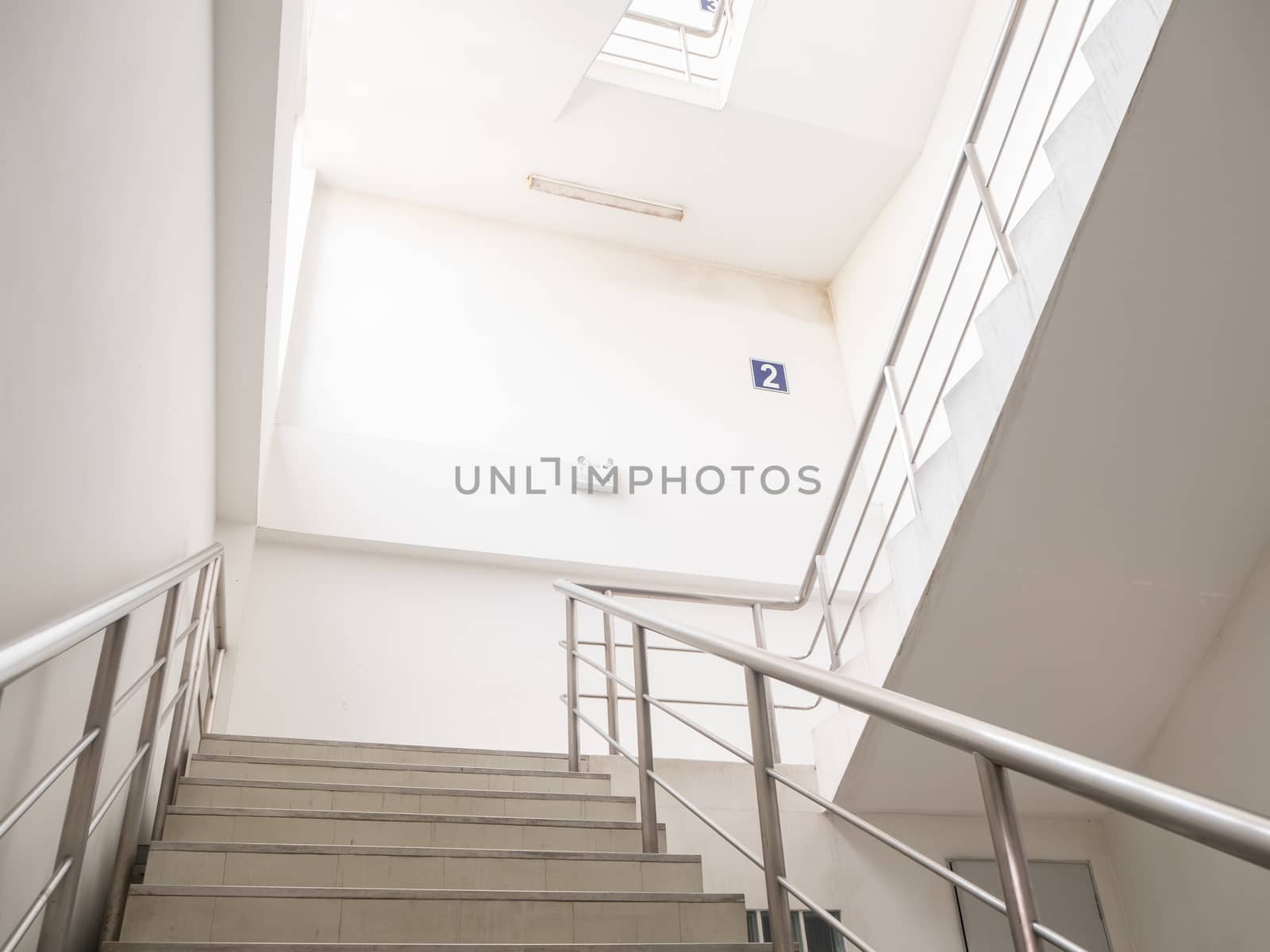 emergency exit , interior  Staircase in modern modern building by shutterbird