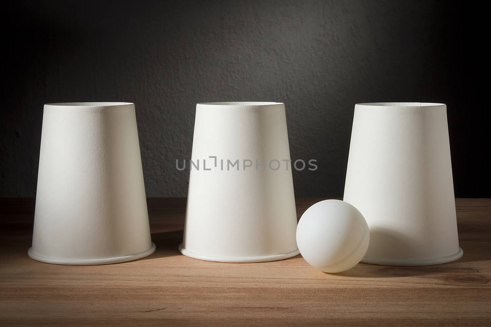 Disposable paper cups and ping pong ball