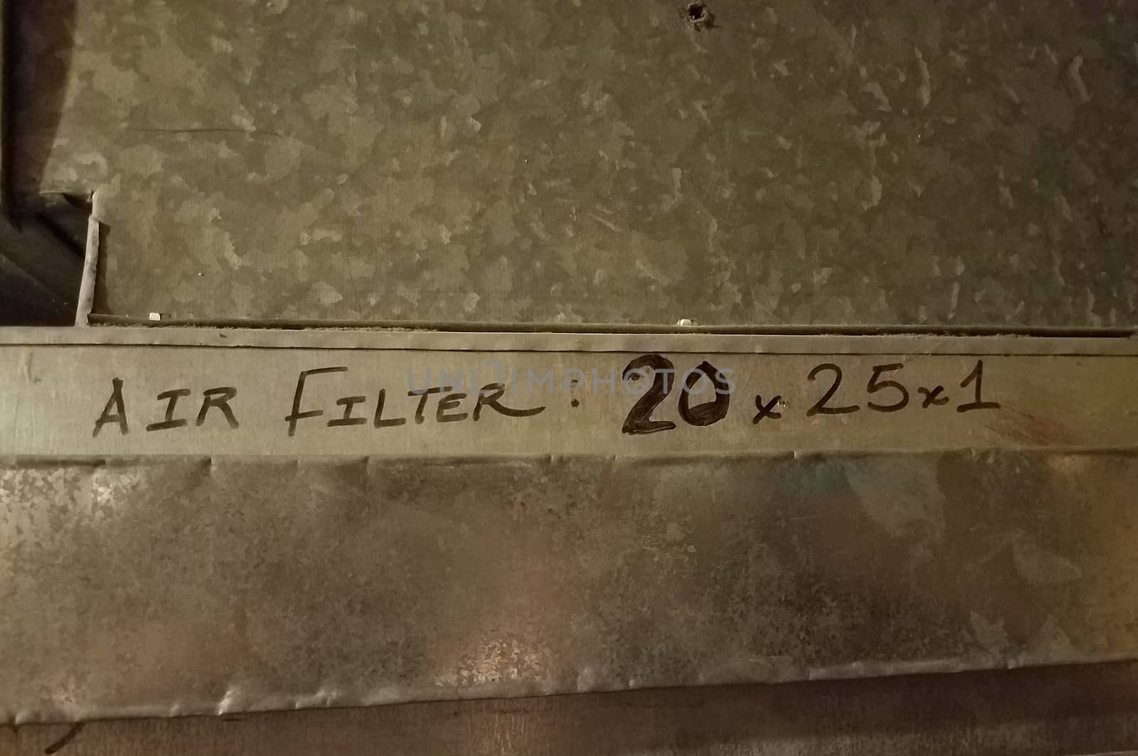 air filter 20 by 25 by 1 written on metal on side of furnace