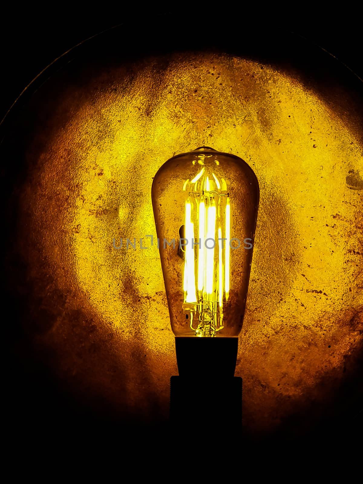 Retro style decorative light bulbs with golden background