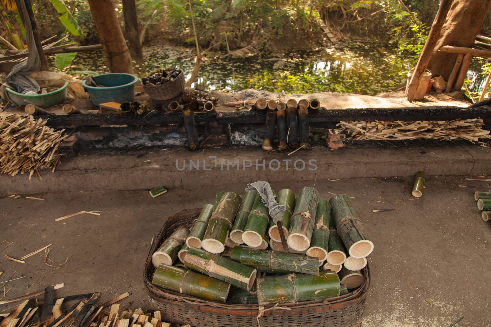 Traditional sticky rice cooked in bamboo as street food as found in Cambodia by kgboxford