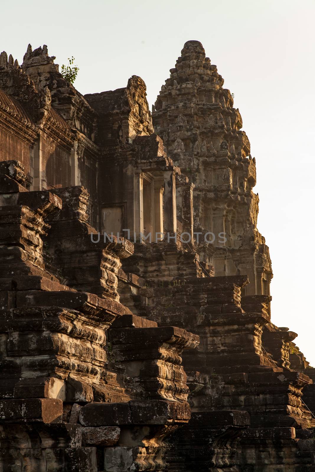 The temple complex of Angkor Watt, Cambodia, early morning sun looking at towers by kgboxford