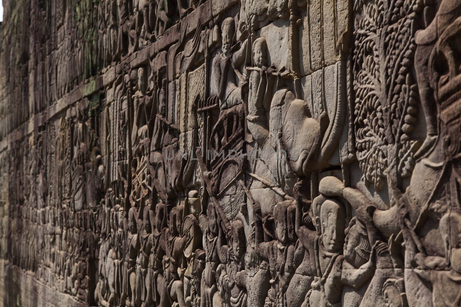 The temple complex of Angkor Watt, Cambodia wall relief depicting ancient wars by kgboxford