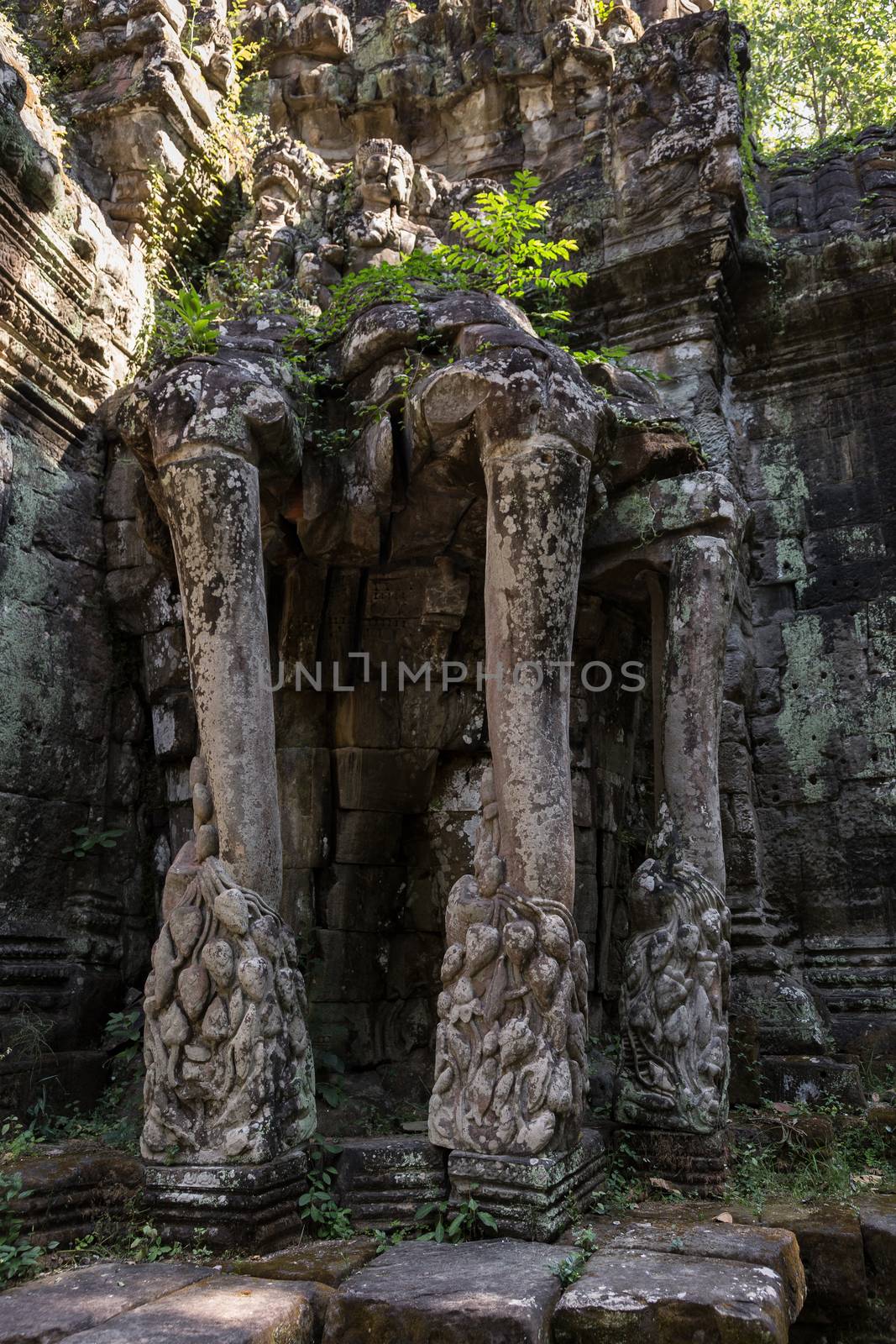 The temple complex of Angkor Watt, Cambodia, with the famous temples of Angkor, Ta Prohm and Bayon. Ancient beautiful carved structures and gateways. High quality photo