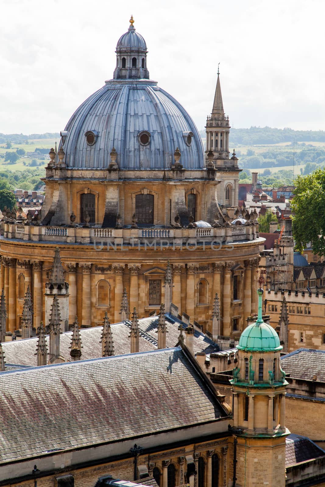Oxford city skyline with Radcliffe Camera in foreground and the the countryside of Boars Hill in the background. . High quality photo