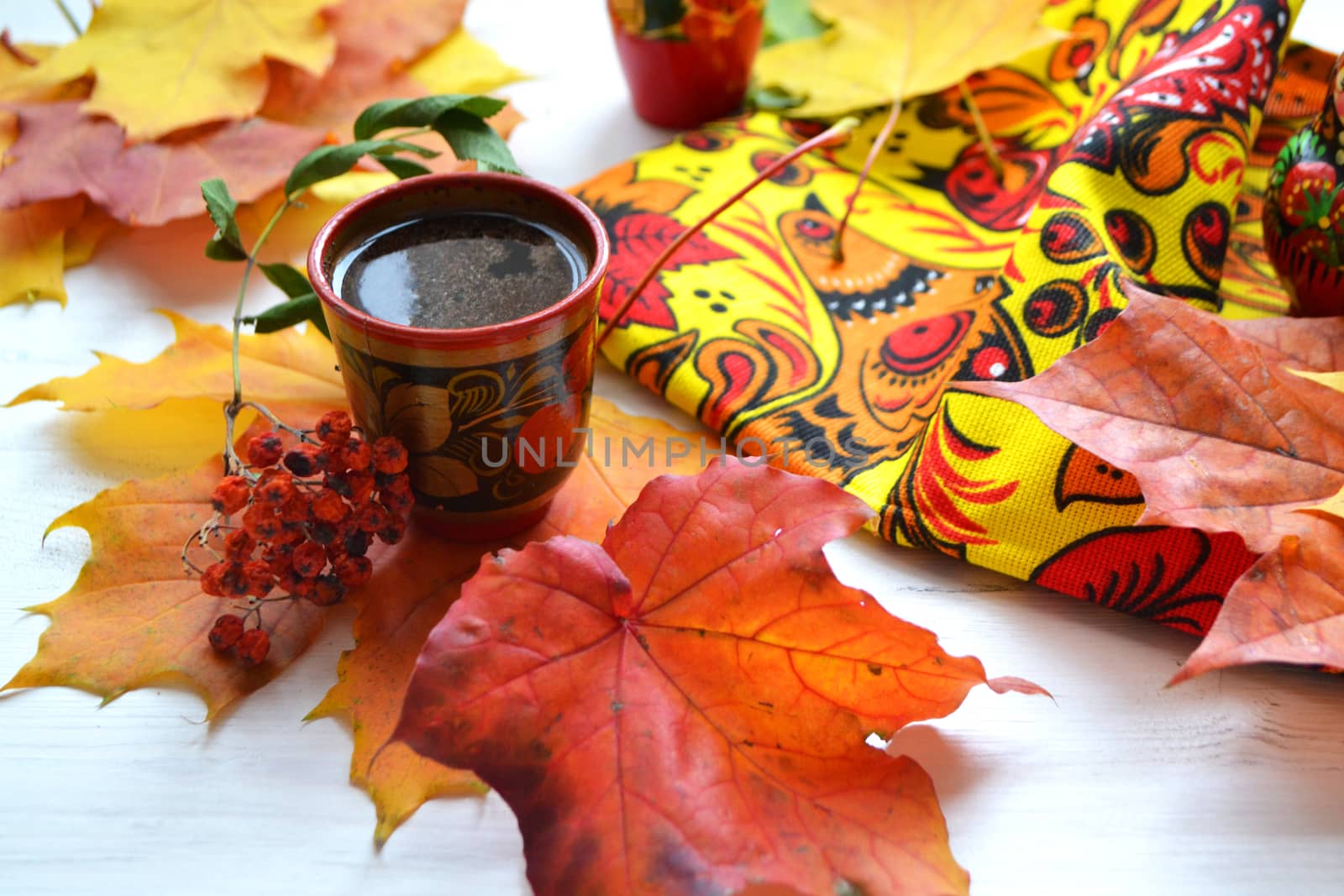 Russian khokhloma style, traditional wood painting handicraft souvenirs, coffee time and autumn decoration