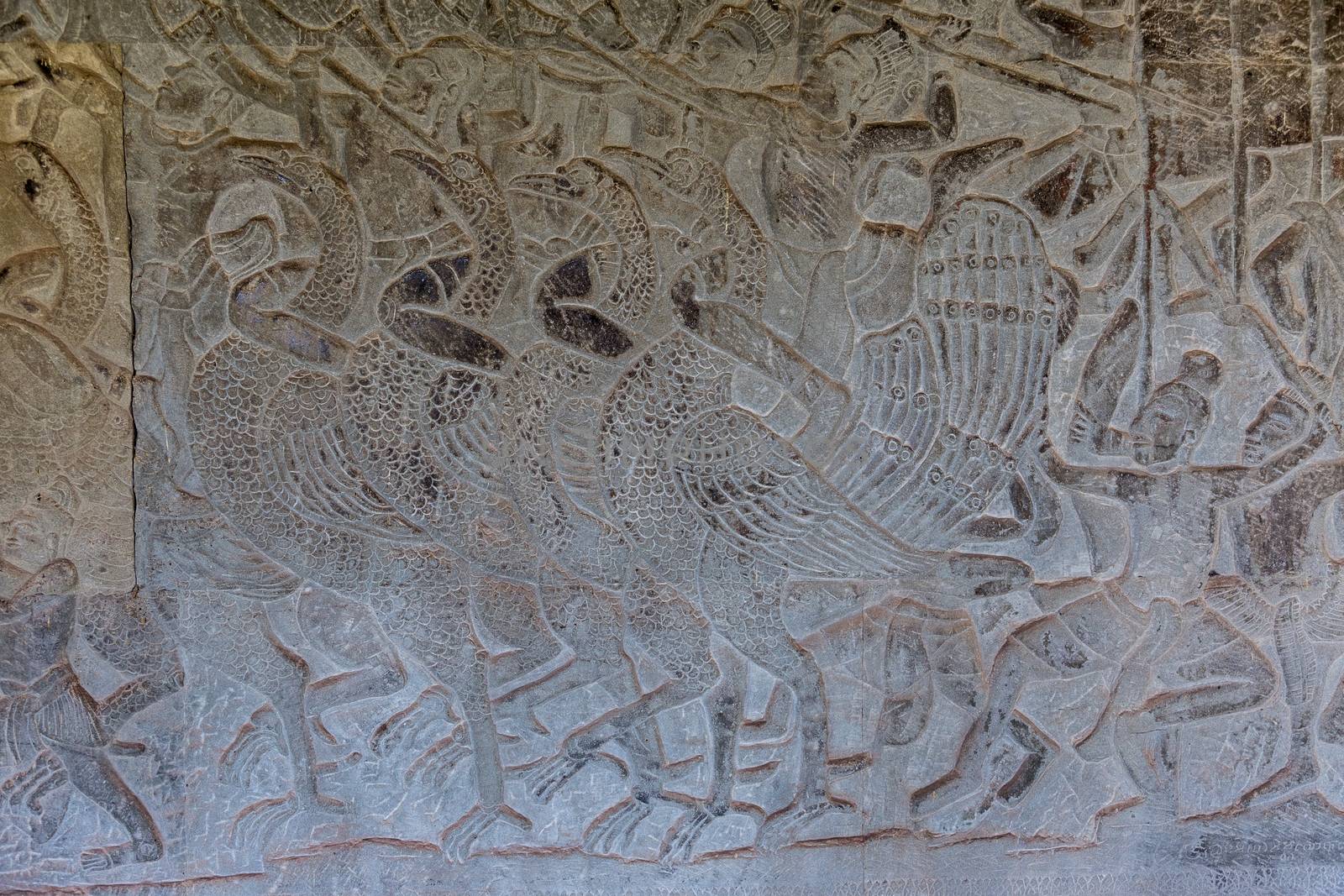 The temple complex of Angkor Watt, Cambodia wall relief depicting ancient wars by kgboxford