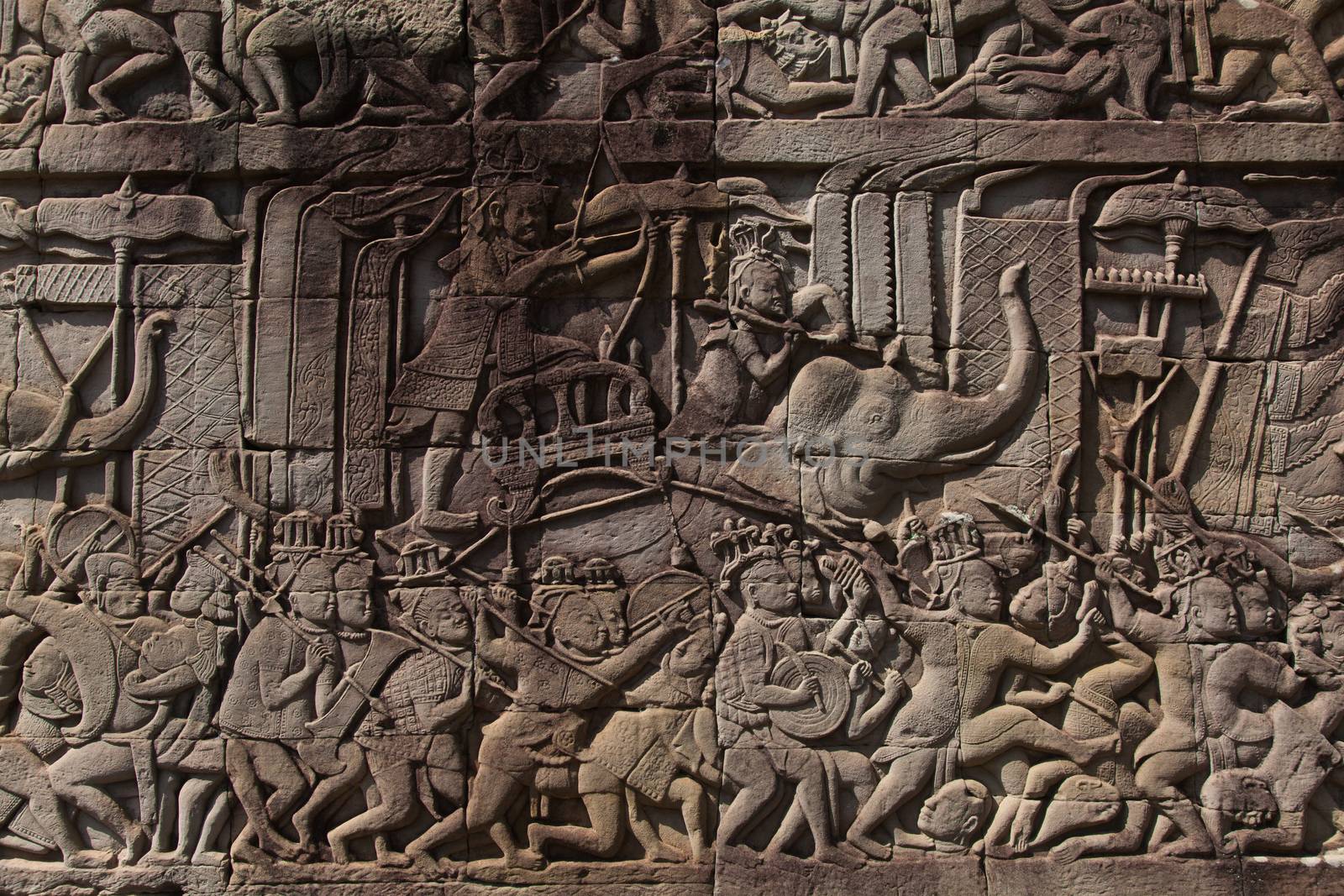 The temple complex of Angkor Watt, Cambodia wall relief depicting ancient wars by kgboxford