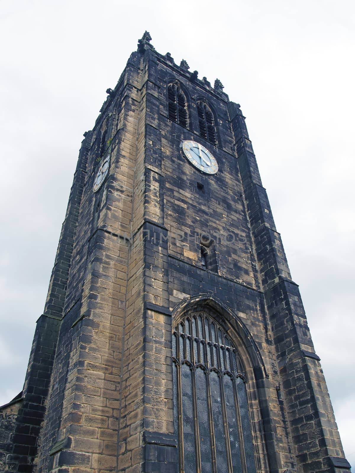 the tower and clock of halifax minster a medieval church in west yorkshire