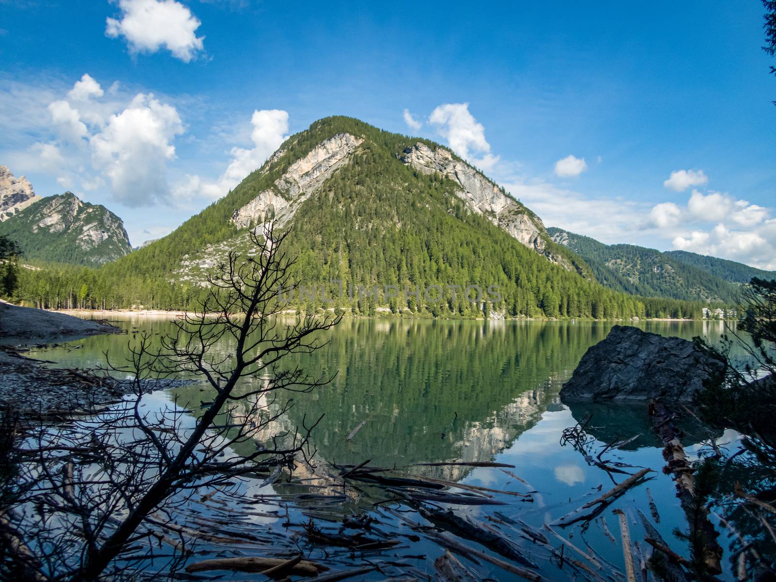 Hiking along the beautiful Braies lake in the Dolomites, South Tyrol