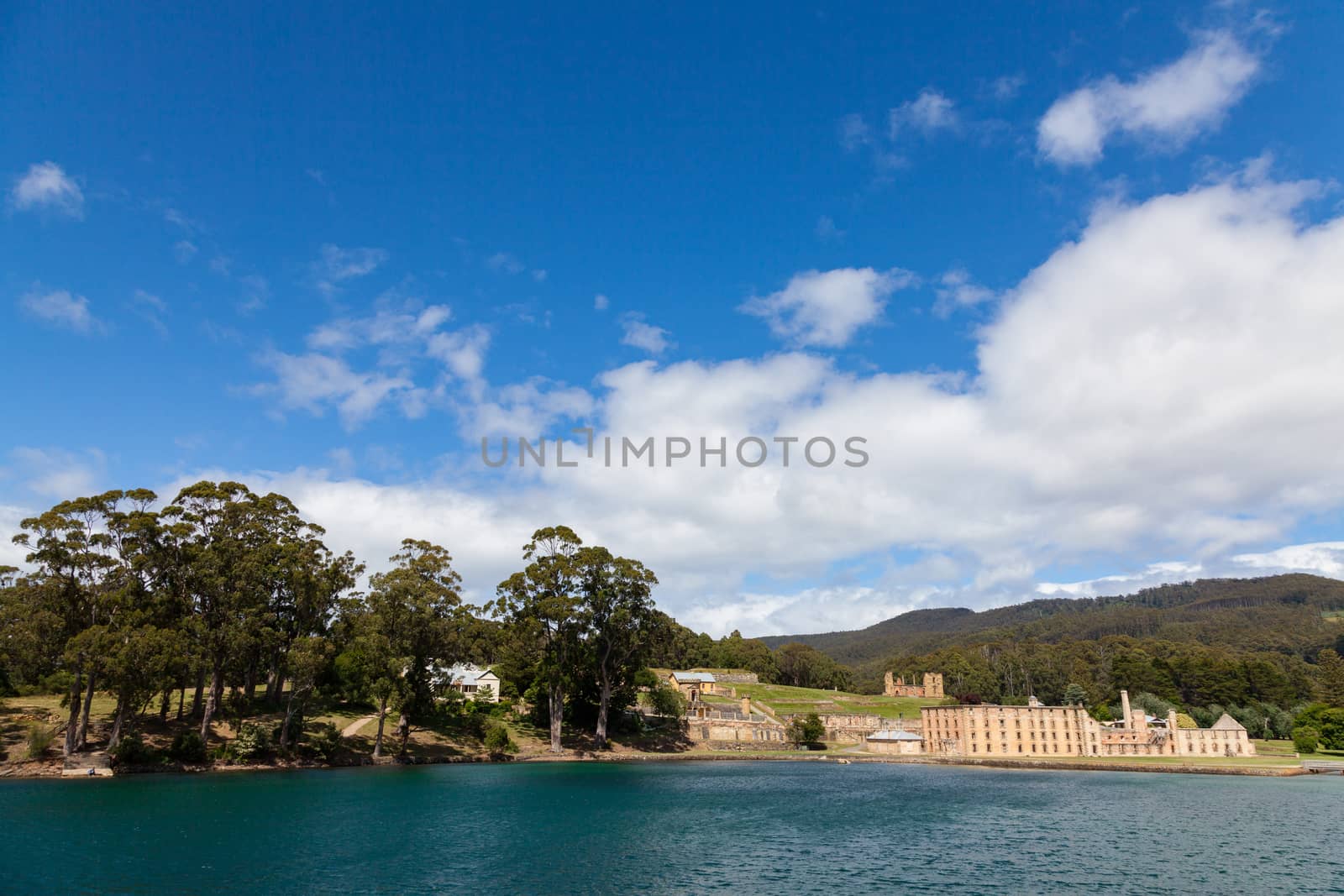 Port Arthur, Tasmania, Australia 25/11/2013 Prison buildings set on the edge of the bay in now lush gardens