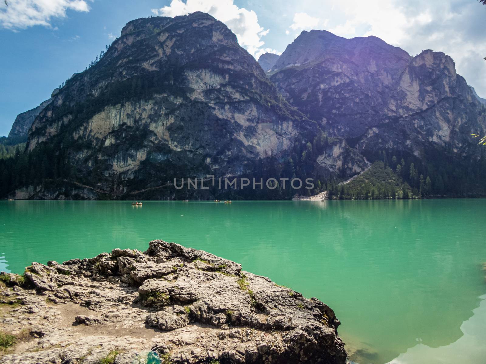 Hiking along the beautiful Braies lake in the Dolomites, South Tyrol