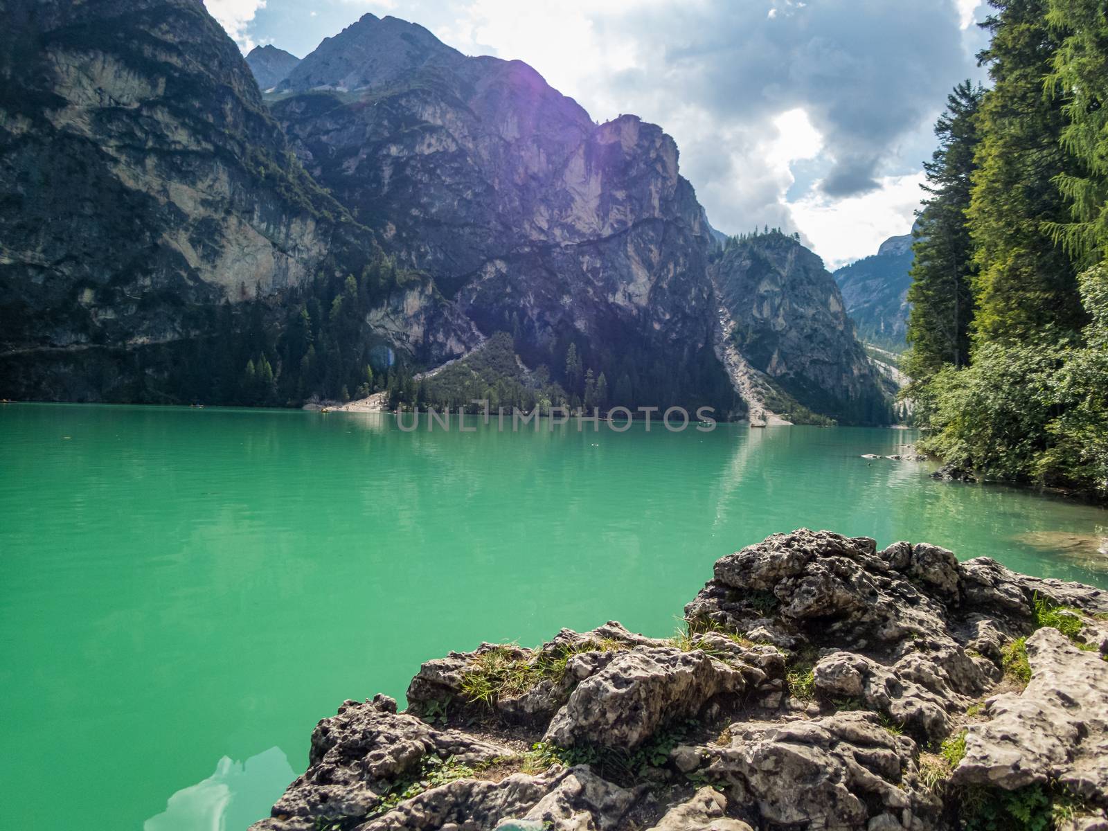 Hiking along the beautiful Braies lake in the Dolomites, South Tyrol