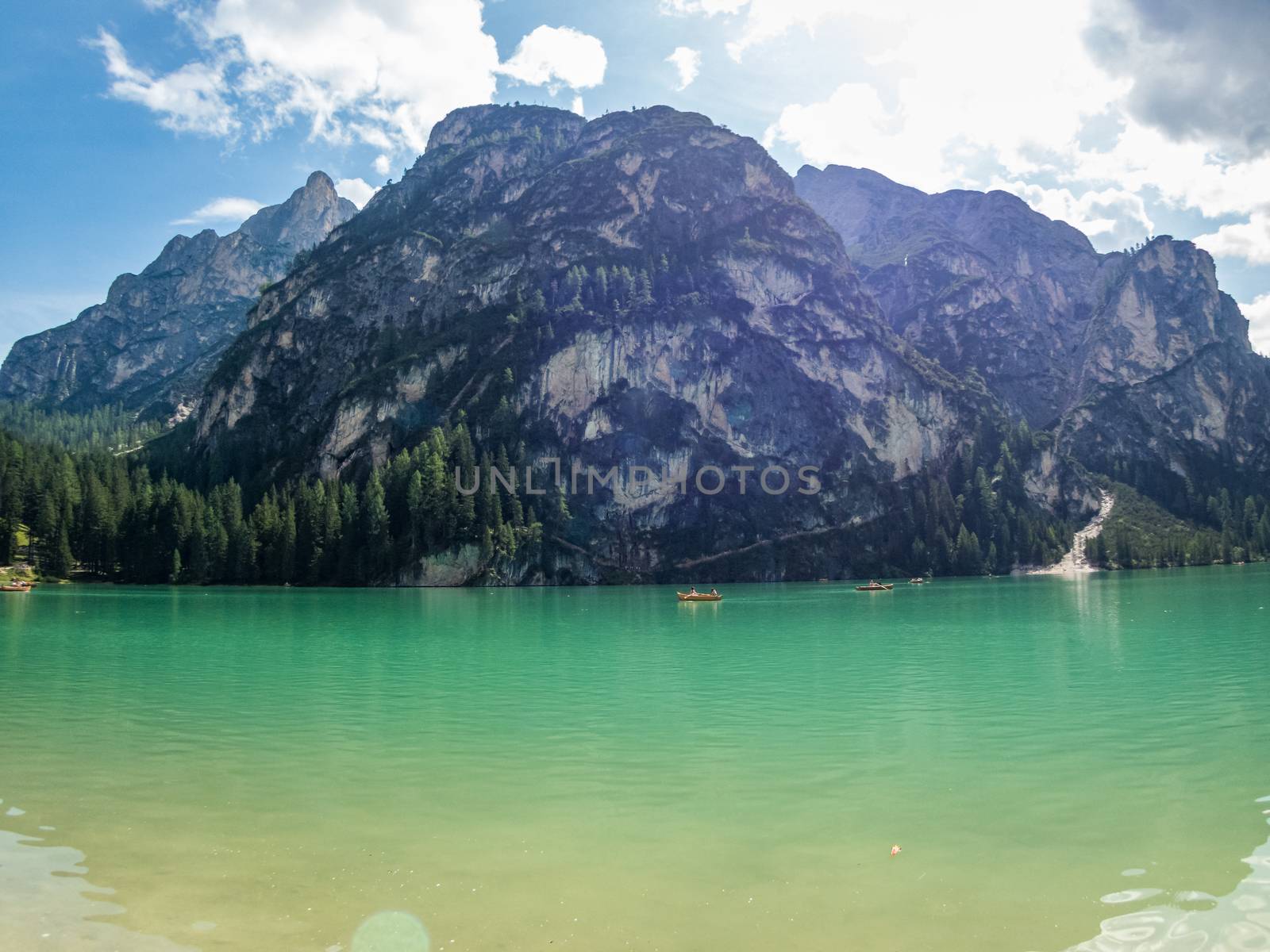 Hiking along the beautiful Braies lake in the Dolomites, South Tyrol