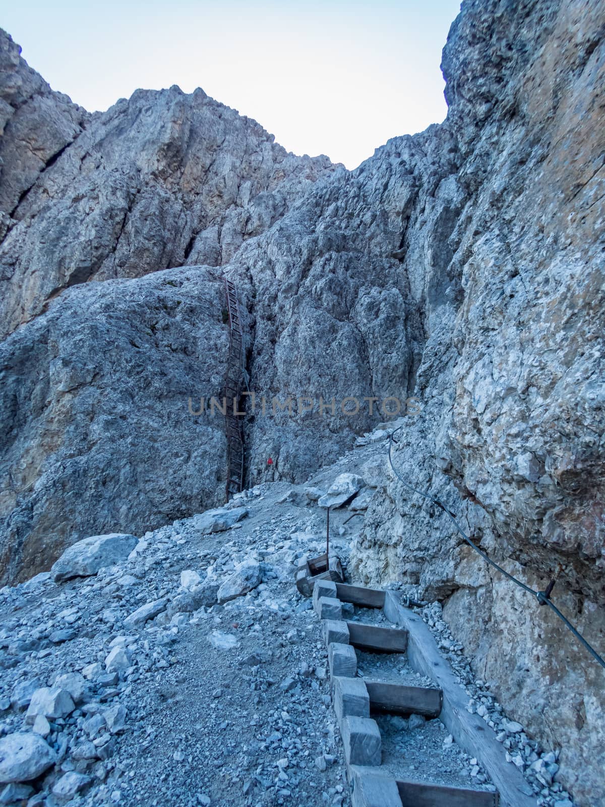 Climbing Rotwand via ferrata near Sexten in the Dolomites, South Tyrol, Italy