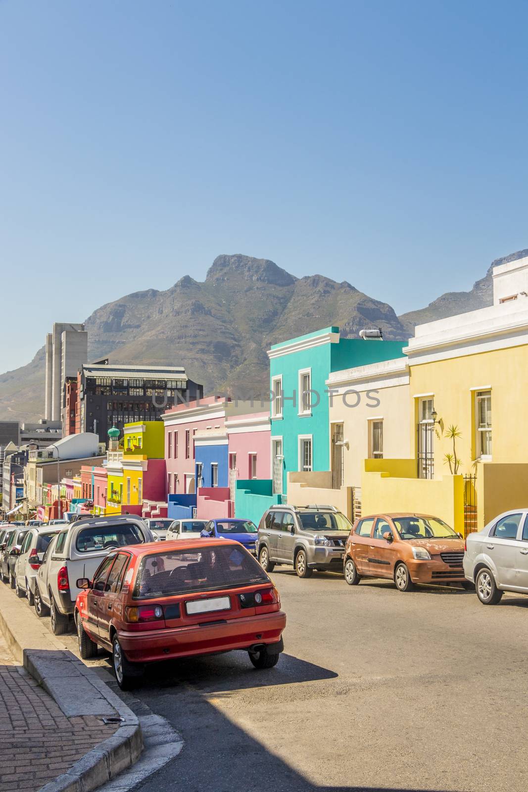 Many colorful houses Bo Kaap district Cape Town, South Africa. by Arkadij