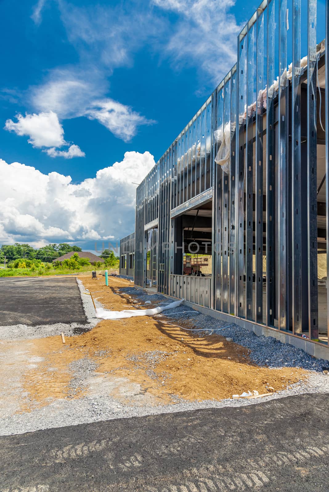 Vertical shot of a new commercial building under construction.