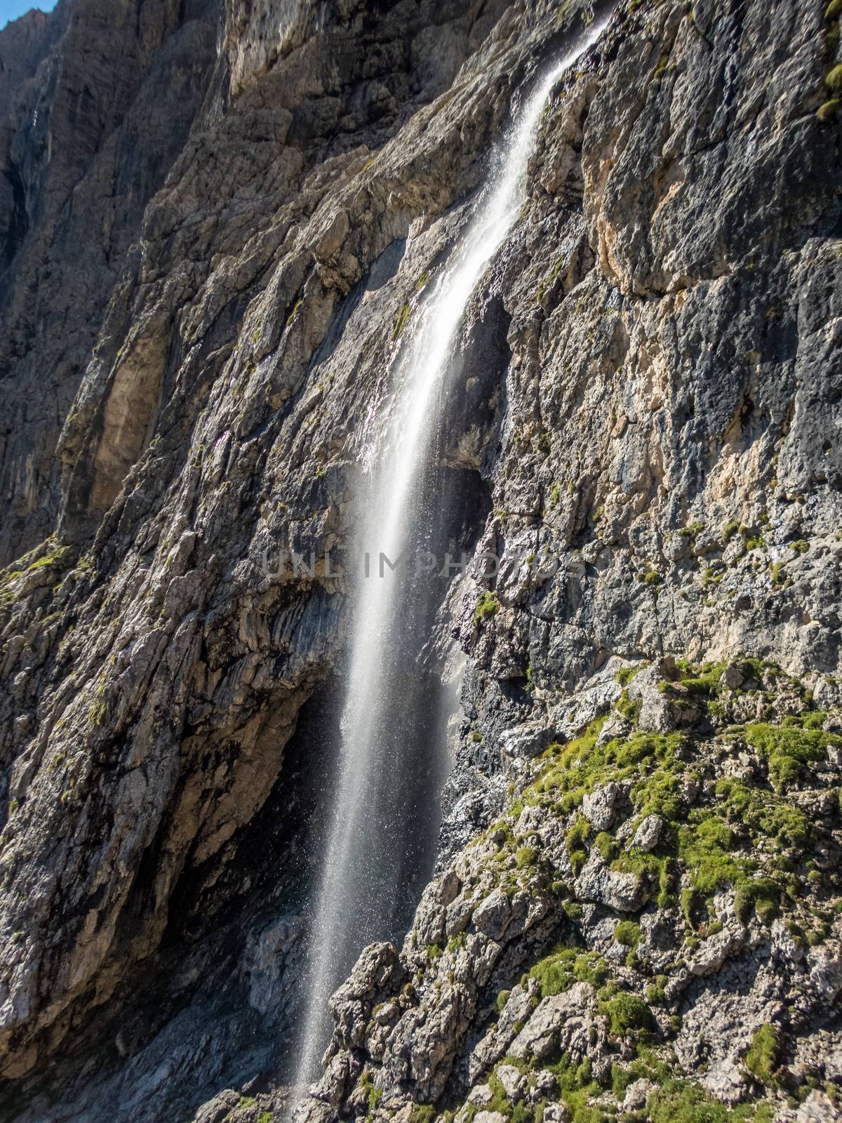 Climbing on the Pisciadu via ferrata of the Sella group in the Dolomites, South Tyrol