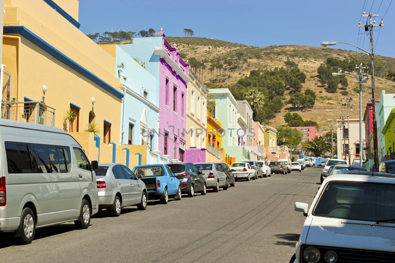 Many colorful houses Bo Kaap in Cape Town, South Africa. by Arkadij