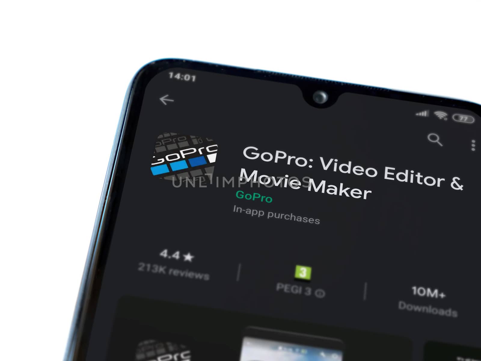 Lod, Israel - July 8, 2020: GoPro - Video Editor & Movie Maker app play store page on the display of a black mobile smartphone isolated on white background. Top view flat lay with copy space.