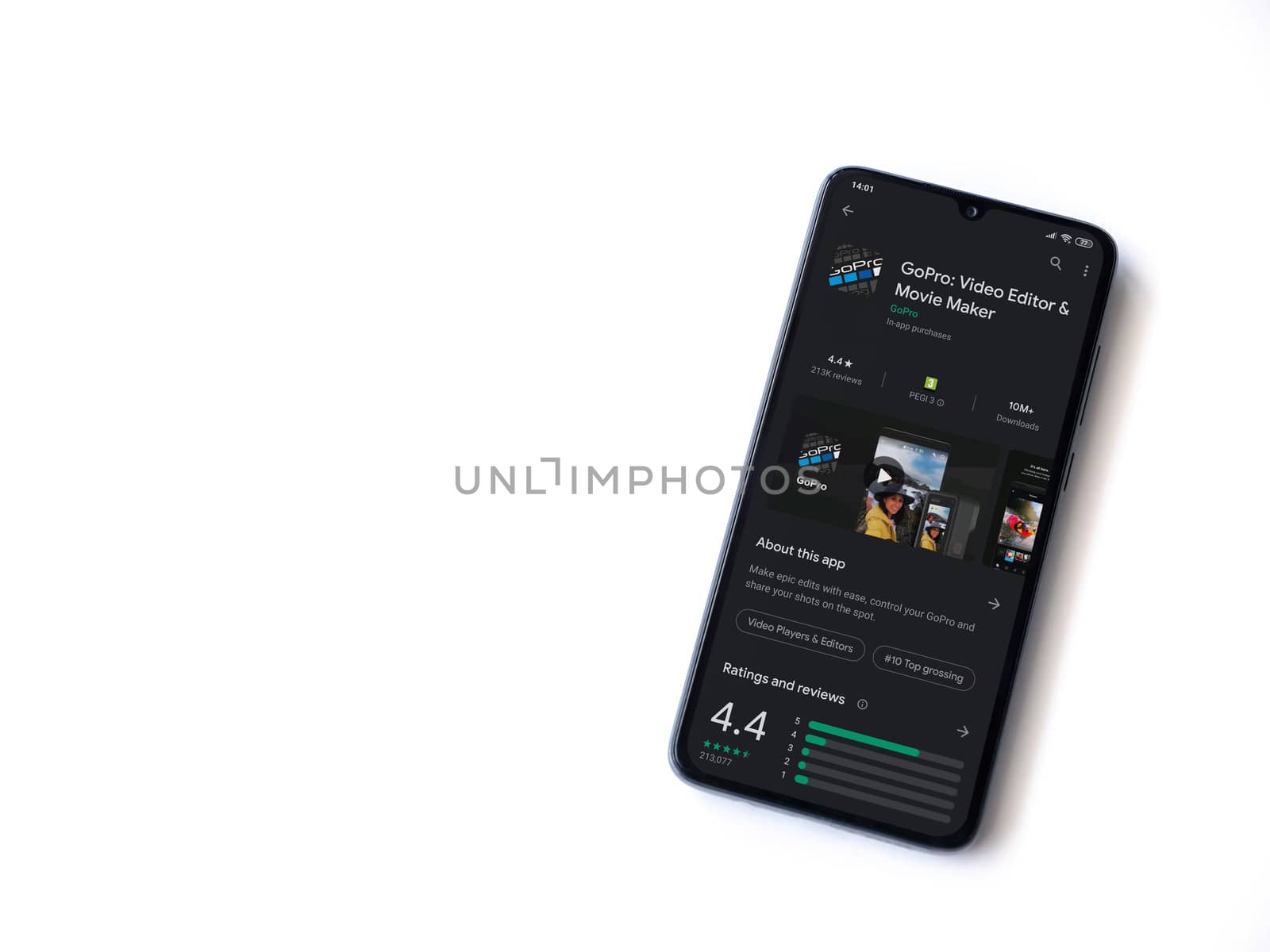 Lod, Israel - July 8, 2020: GoPro - Video Editor & Movie Maker app play store page on the display of a black mobile smartphone isolated on white background. Top view flat lay with copy space.