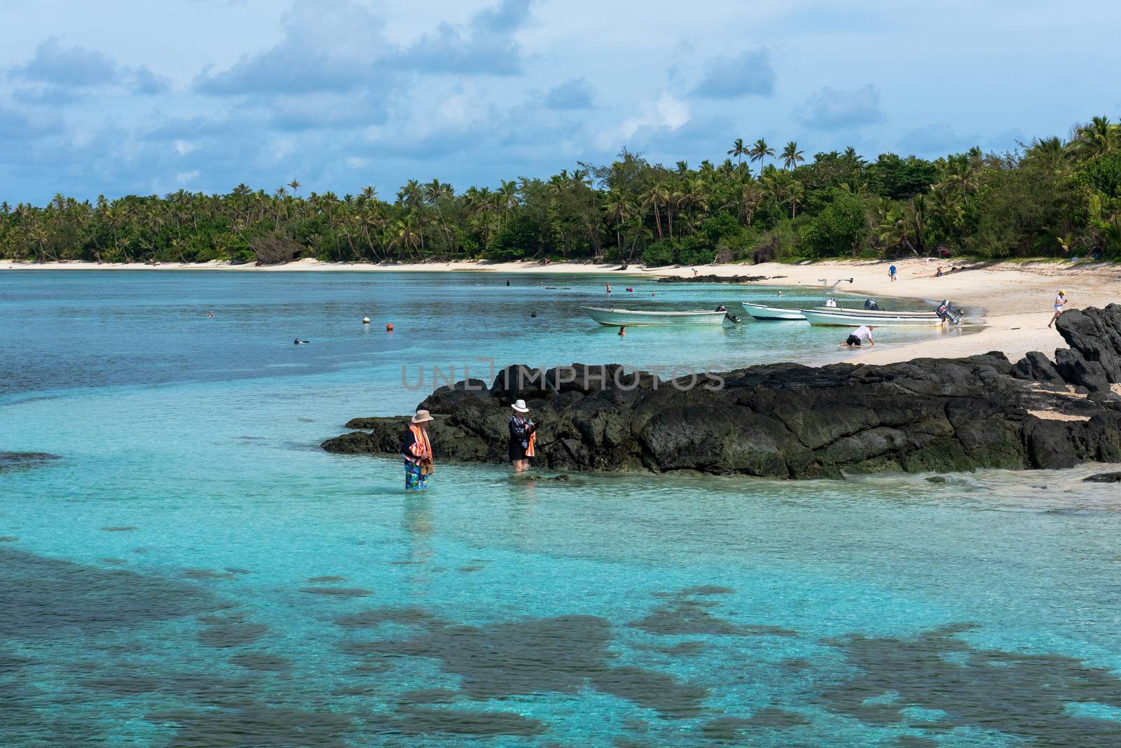 Tourists at a Fiji Beach by jfbenning