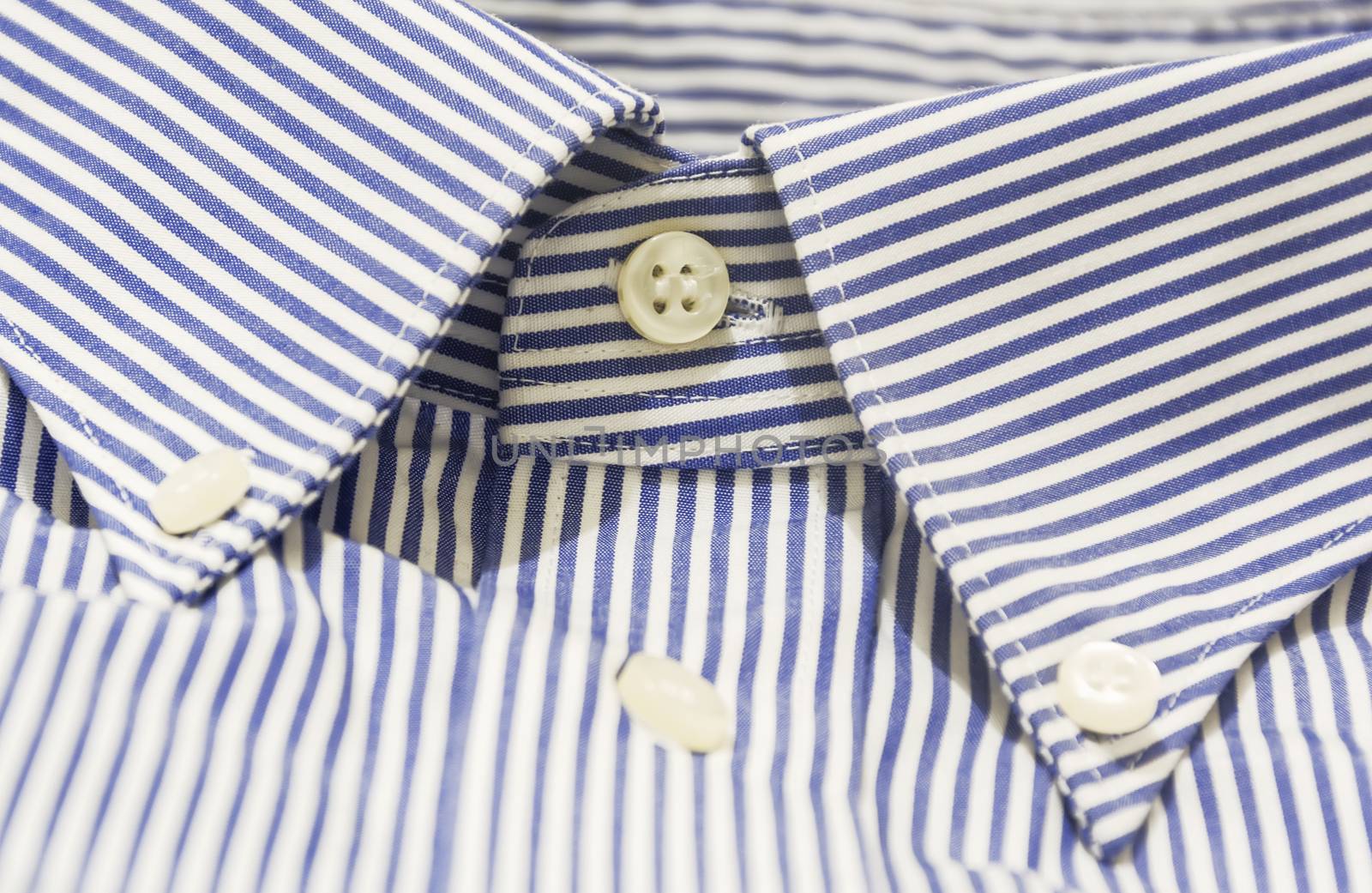 A blue striped shirt with a button down collar. by rarrarorro