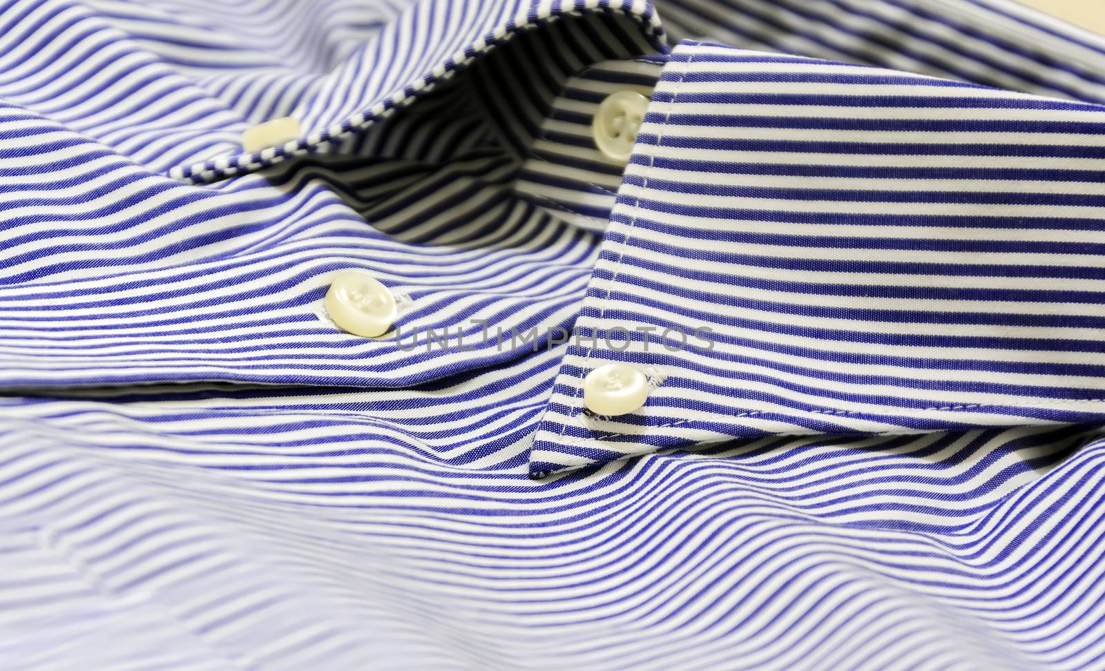 A blue striped shirt with a button down collar. by rarrarorro