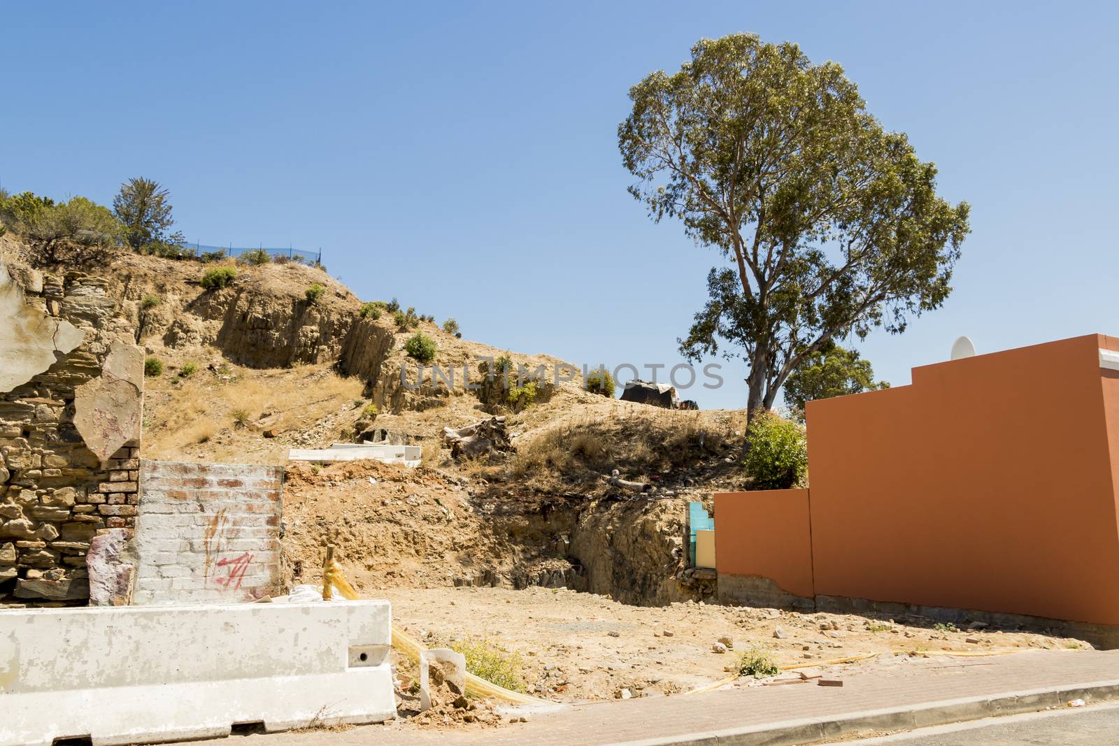 Construction site dirt and destruction, Bo-Kaap, Cape Town. by Arkadij