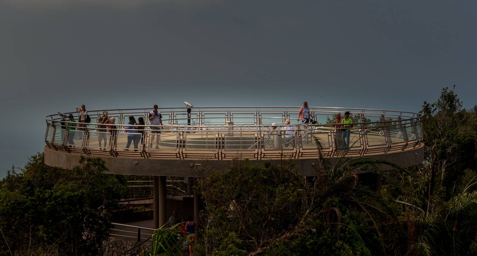 Langkawi, Malaysia -- March 8, 2016. Tourists gather on an Observation Post by the Langkawi Sky Bridge to gaze over their surroundings.