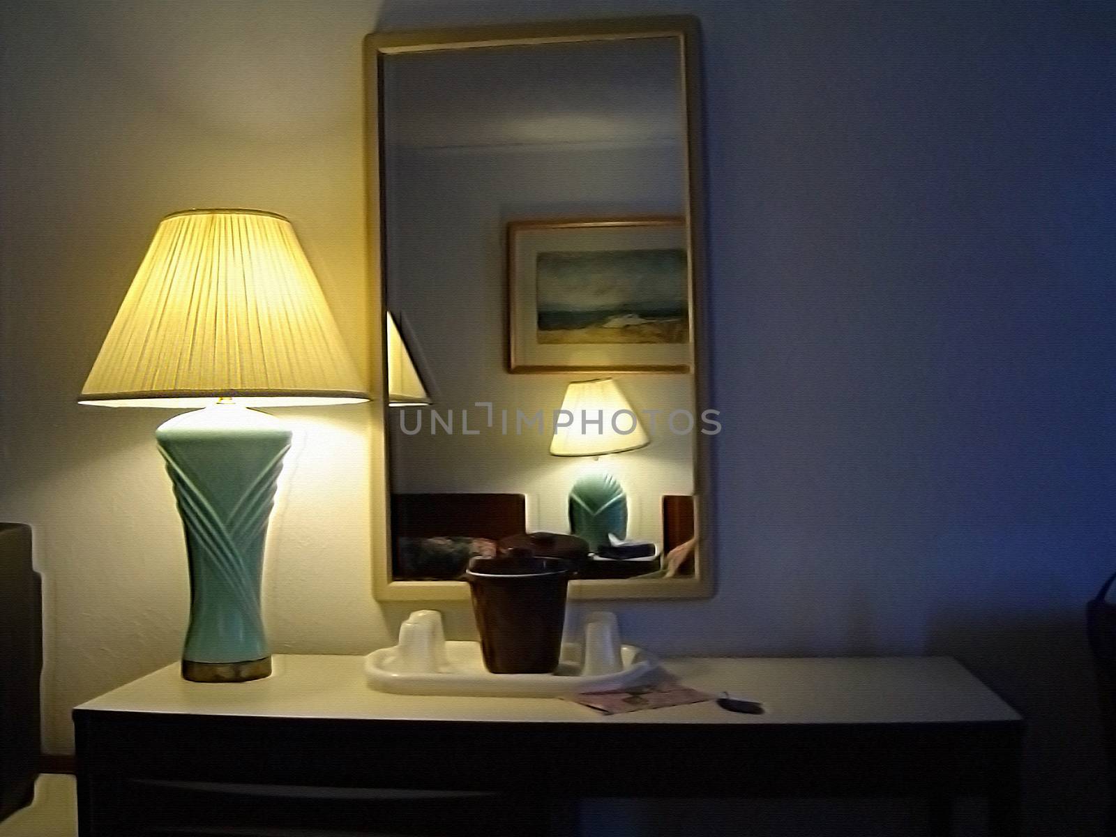 Table lamp on bedroom table and mirror