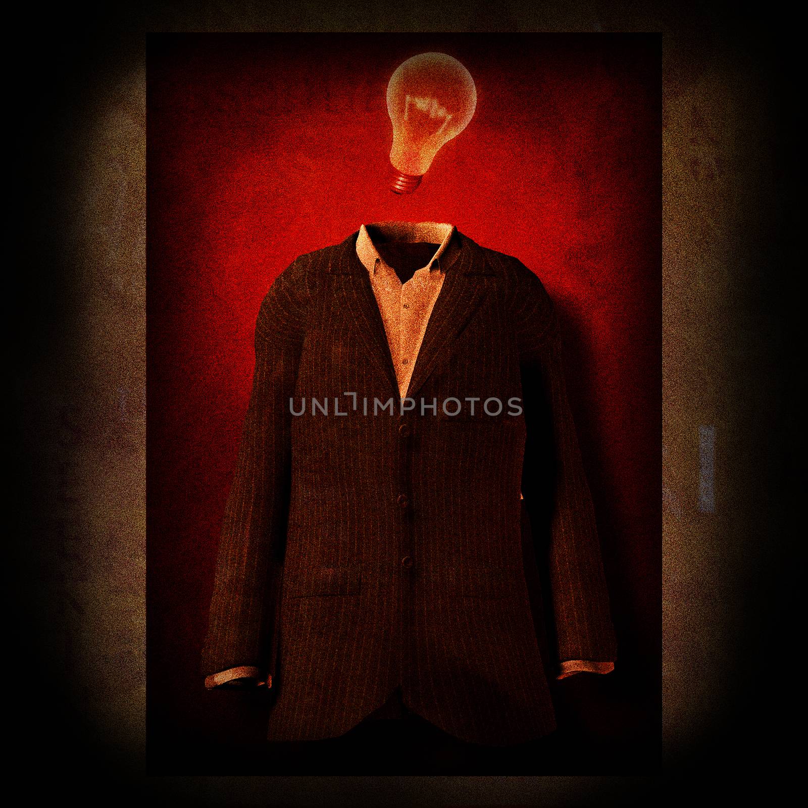 Symbolic composition. Men suit and light bulb