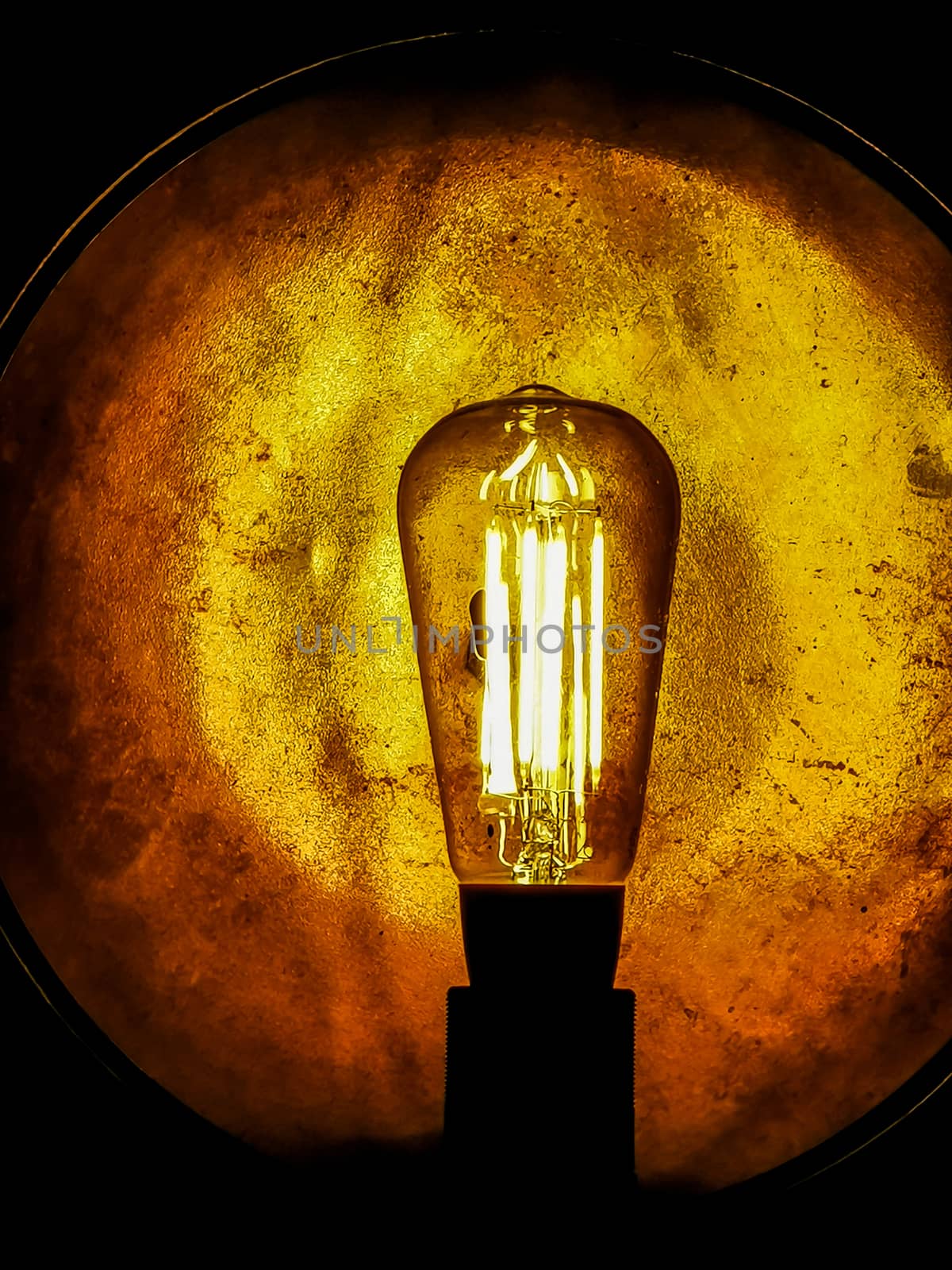 Retro style decorative light bulbs with golden background by sonandonures