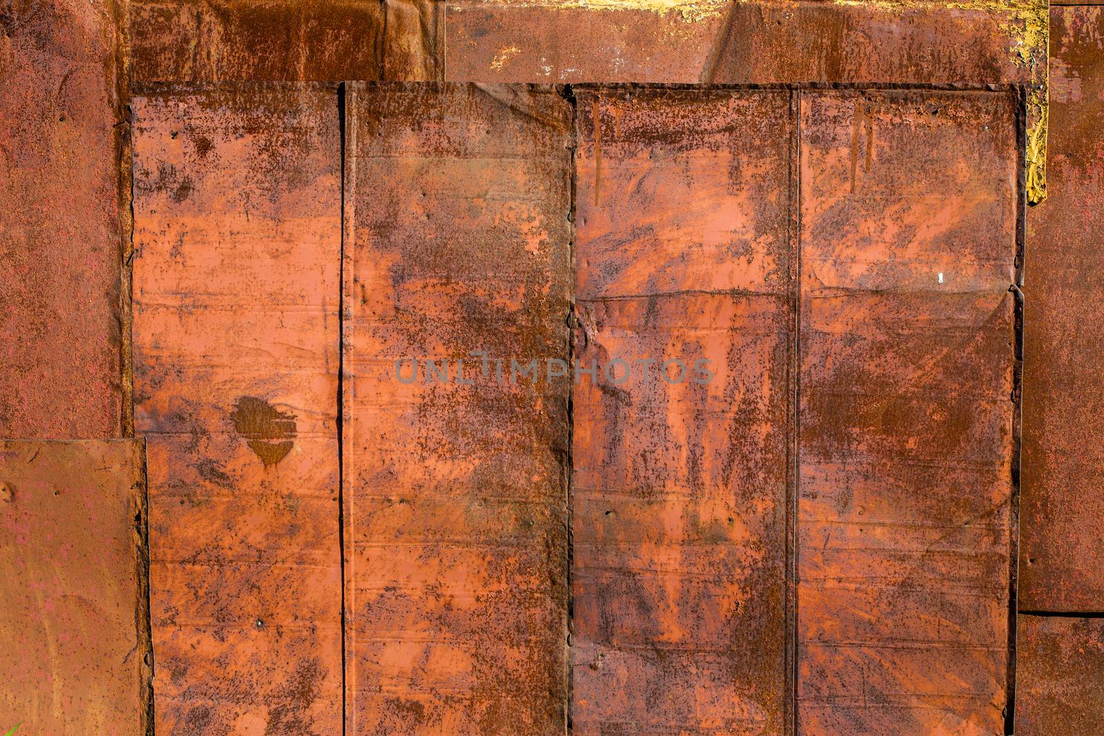 rusted tin sheets patchwork wall texture and flat detailed background