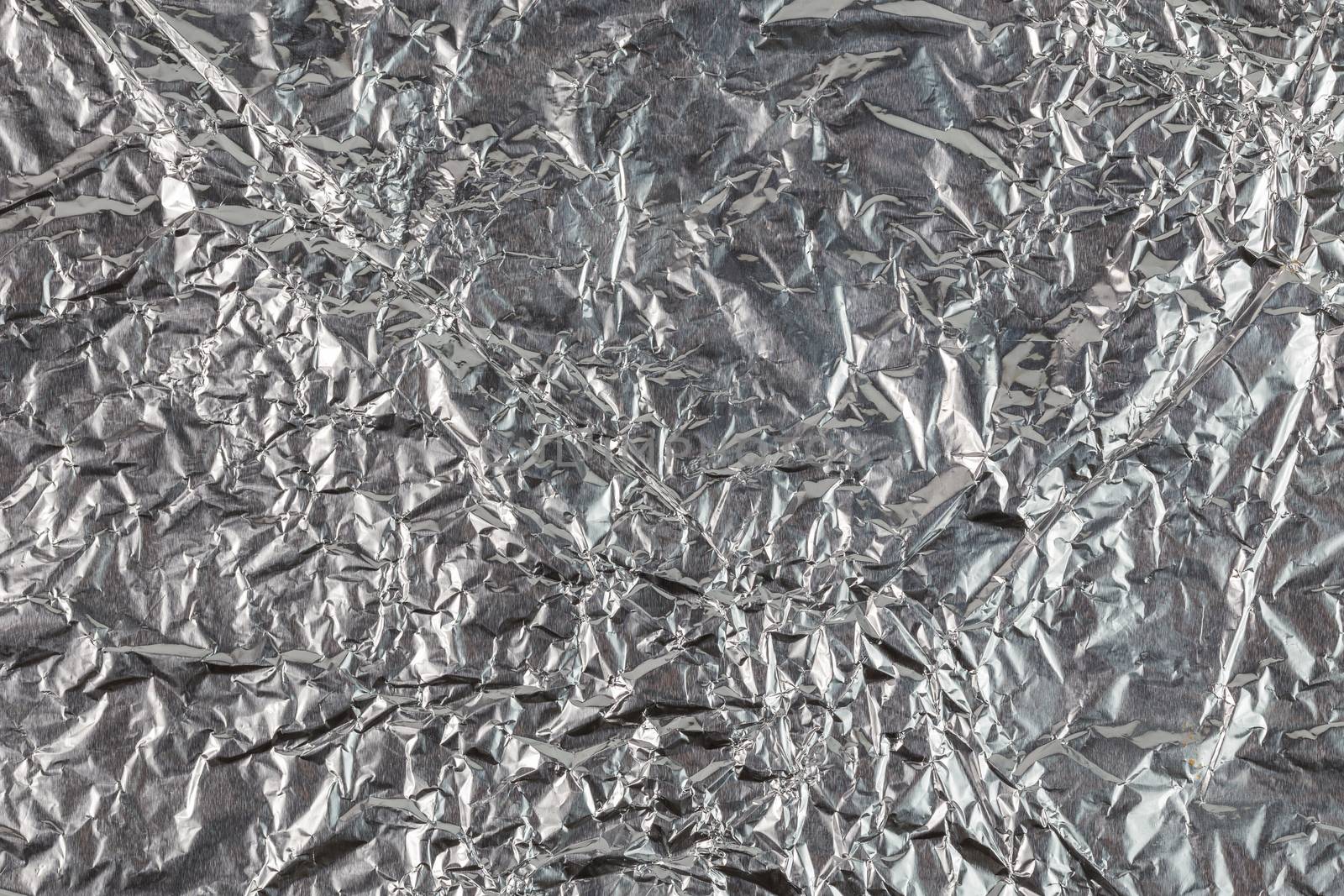 crumpled aluminium foil flat background and texture by z1b