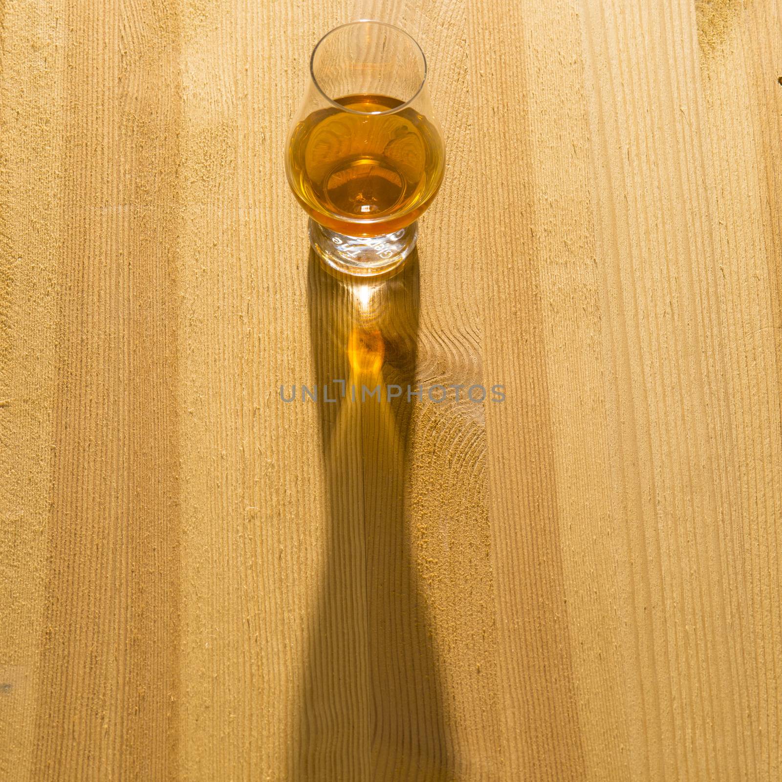 Whisky with sun shadow