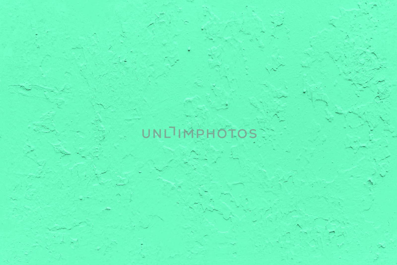seamless texture of flat thick painted aqua menthe color surface under direct sunlight - new paint over fragments of old peeled one