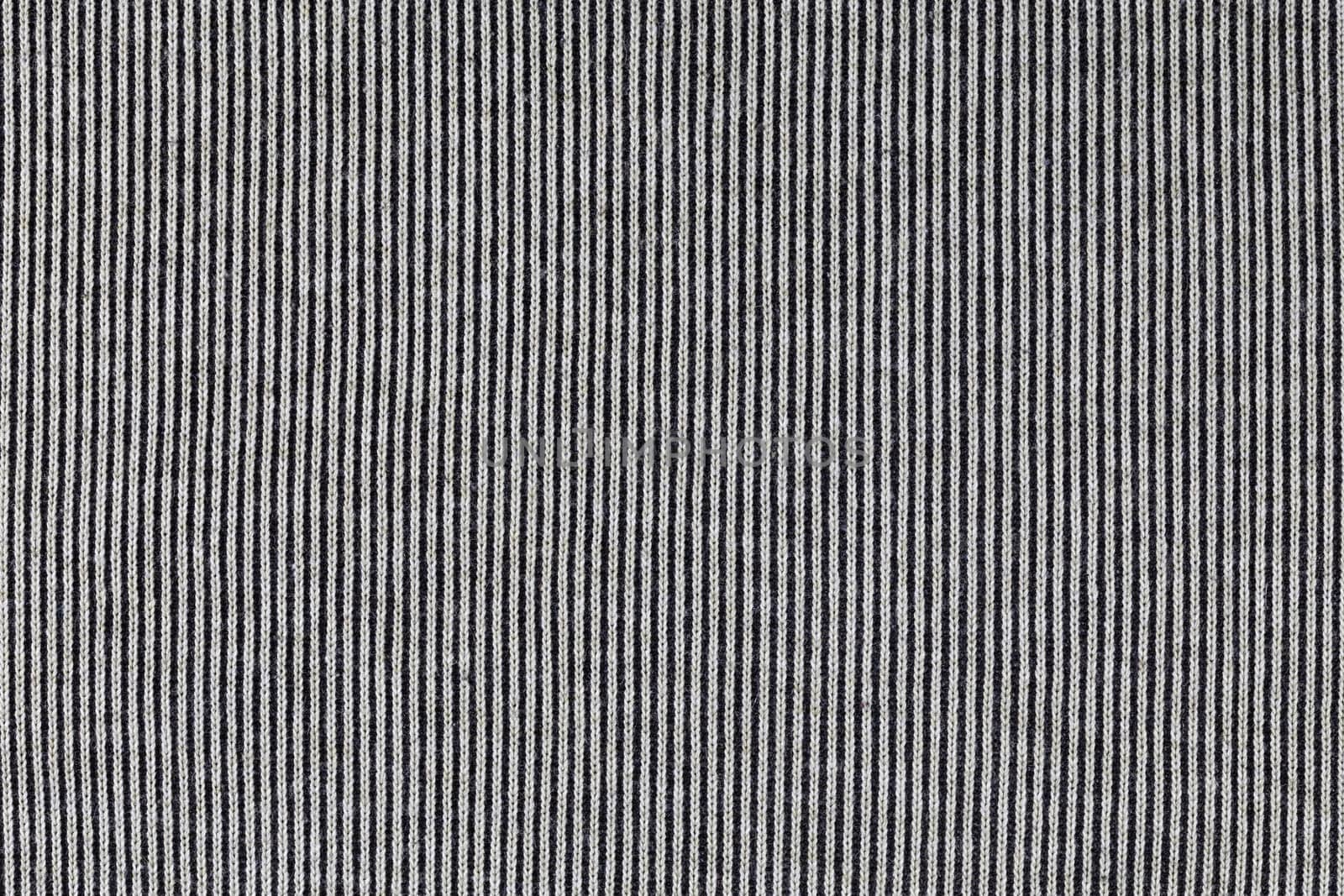 abstract vertical stripped texture of flat fabric surface.