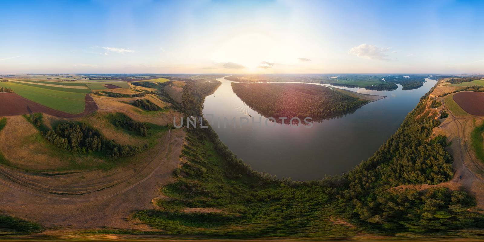 Aerial drone view of river landscape in sunny summer evening by rusak