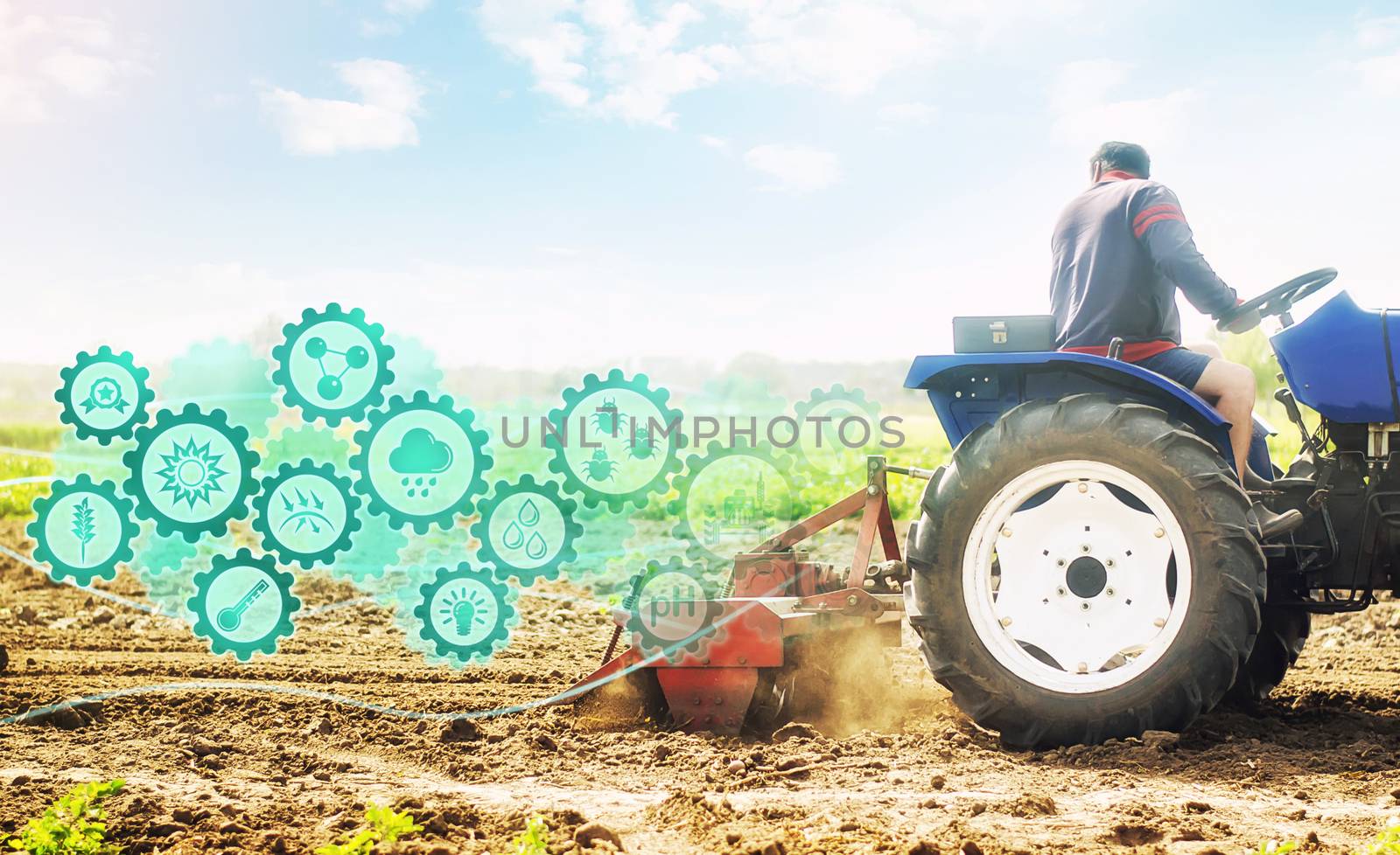 Farmer on a tractor cultivates a farm field and technological innovation gears hologram. Science of agronomy. Farming and agriculture startups. Improving efficiency. Soil milling, crumbling and mixing by iLixe48