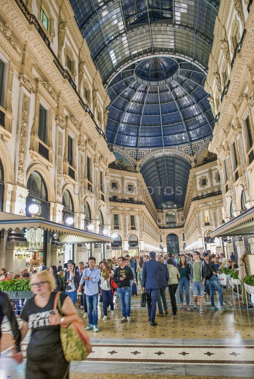 MILANO, ITALY - SEPTEMBER 2015: Galleria Vittorio Emanuele II in Milano. It's one of the world's oldest shopping malls, designed and built by Giuseppe Mengoni.